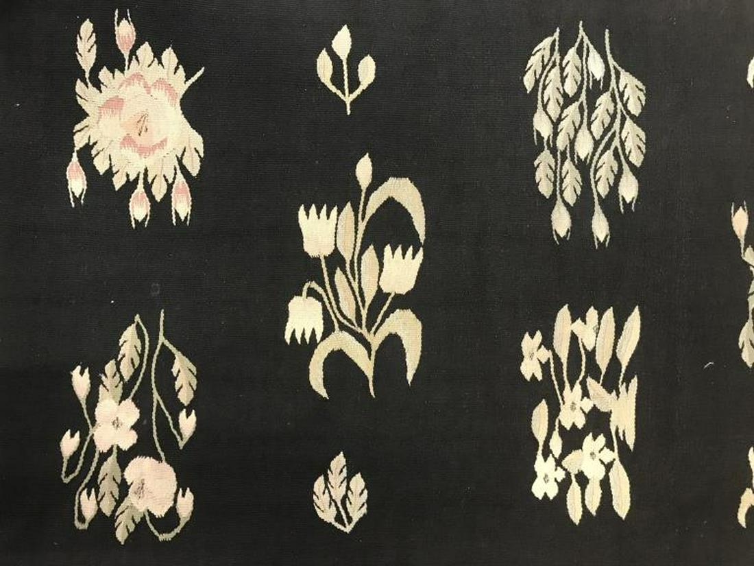 Handmade Arabian Kilim Wool Rug: Piece is handmade and wool. Condition fringes and multi toned floral detail. Piece is Flat Weave. With tones of pink, lavender, slate, & tan. Piece measures approx 123 inches long 31 inches wide. runn