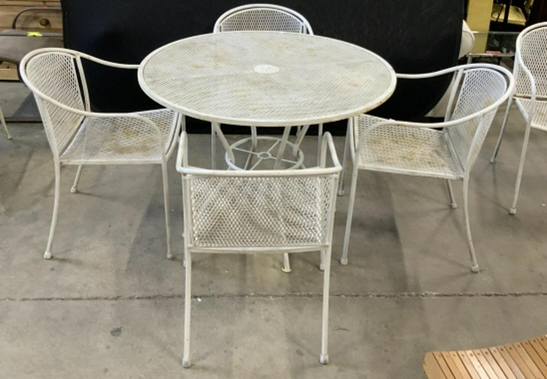Russell Woodard Dining Table W 6 Chairs: Outdoor Metal And Iron outdoor Dining Table and Chair Set. Fishnet Mesh Design Table w six chairs, and , tubular Frames. Circular Table. Height 29 1/2 inches diameter 41 inches, each chair measures ap