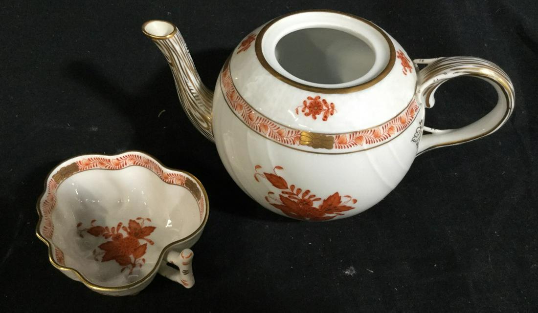 Lot 2 HEREND Chinese Bouquet Red Tableware: Originally named "Apponyi Flowers" for Count Albert Apponyi, this 1930-vintage pattern features floral motifs adapted from earlier Herend patterns. Teapot without lid, measures approx 7.5 in. long, 4 