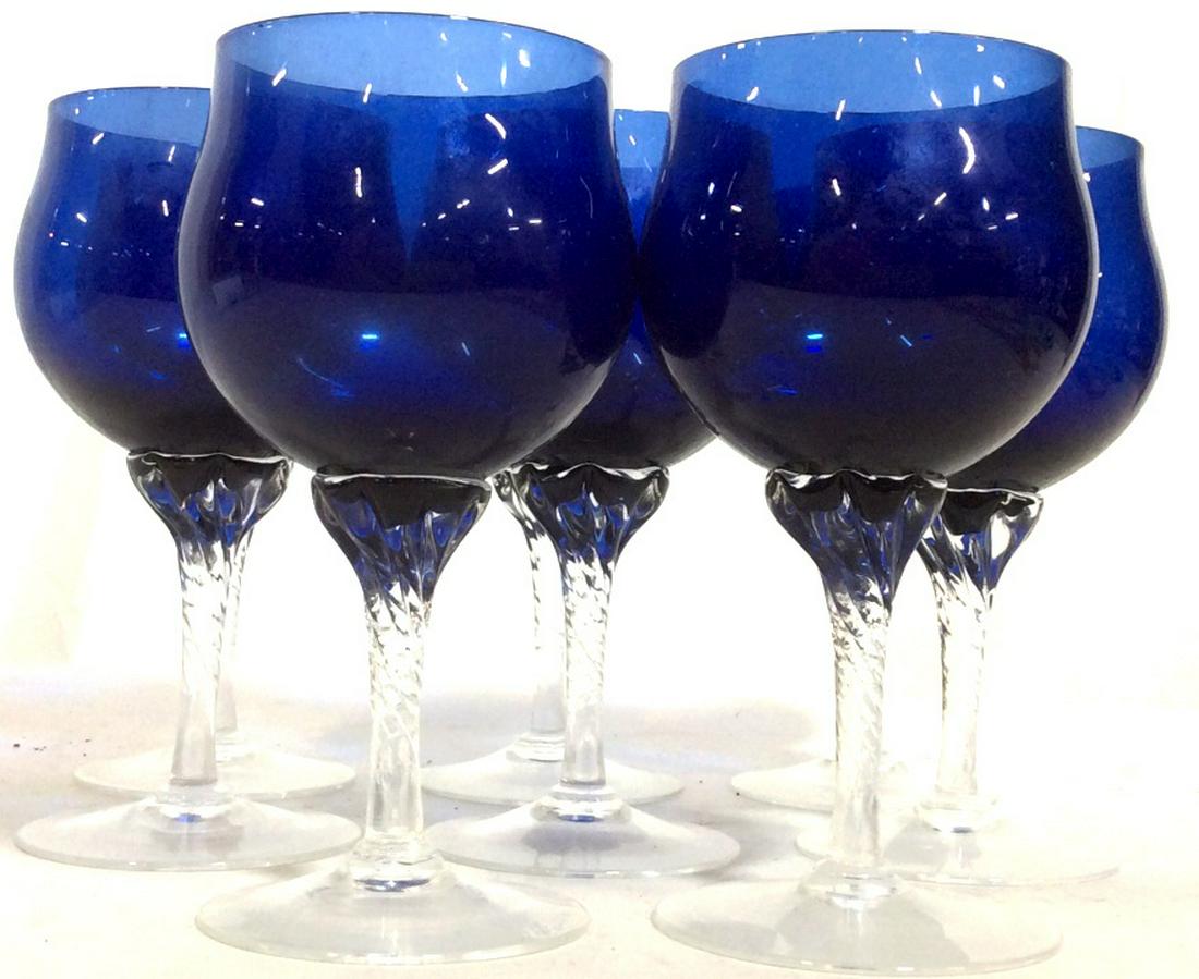 Set 8 Sapphire Blue Tulip Shaped Crystal Stemware: Glasses for wine or your choice or beverage. Twisted Clear Crystal Stems And Blue vessels. No scratches, Chips or other surface marks. 6.5 in. tall, approx 11 in. cup circumference. Blue Crystalware, 