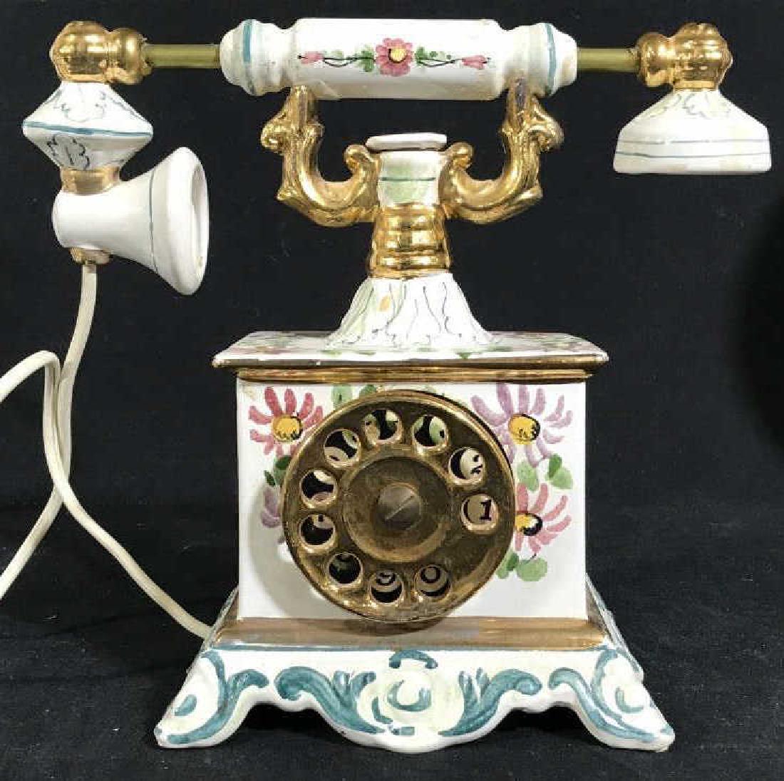 Italian Hand Crafted Simulated Antique Phone: Porcelain upright phone with old fashioned handle and phone dial in French Style. Hand Painted by CESARE 1969. Stamp Marked on underside. For decor only. Some surface wear and tape residue, Phone hand