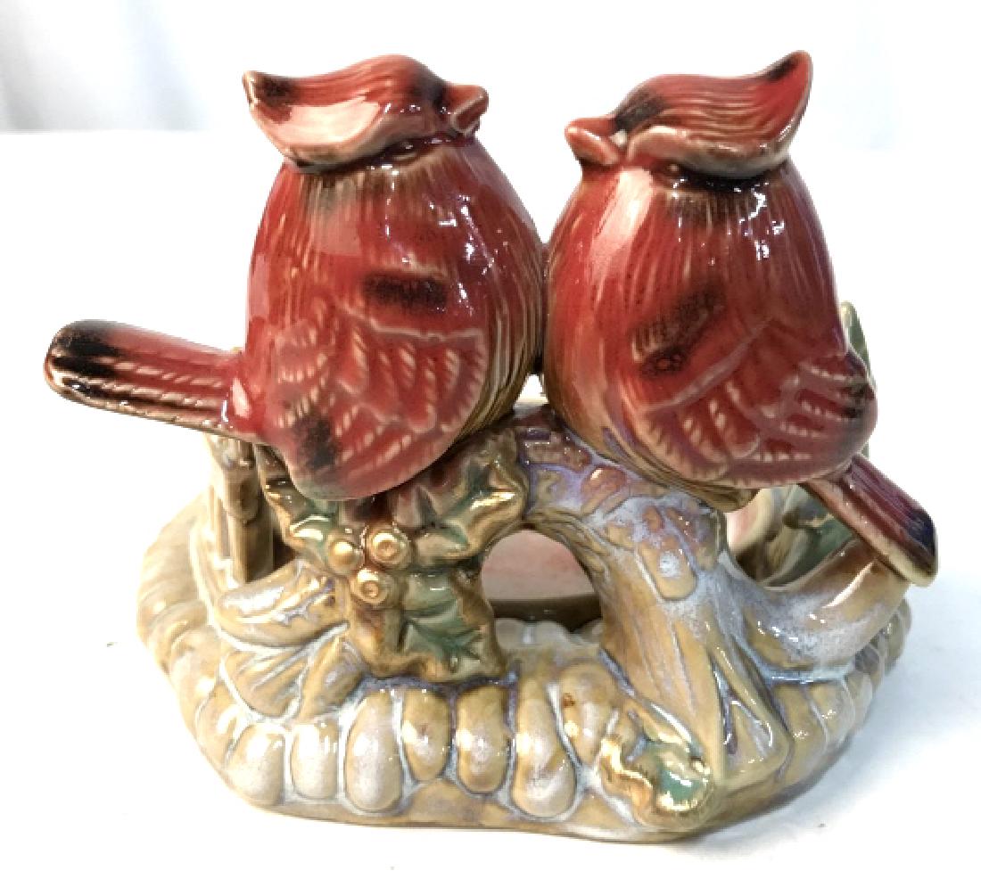 Ceramic Cardinal Candle Holder: Painted ceramic/Porcelain pieces on a trimmed bottom piece, with pine trees and fence decorations. Coaster/candleholder, measures at approximately 3.8 inches tall, and approximately 5 inches long. Coa