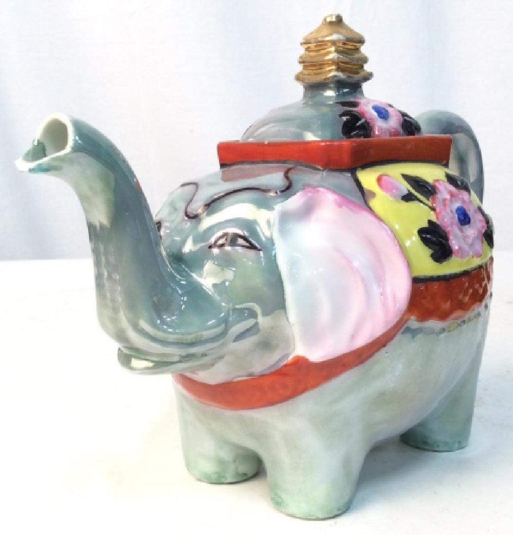 Vintage Elephant Collector Teapot: Beautiful Vintage Hand painted elephant Gold Castle. Made in Japan. Teapot measures at approx 7.5 inches tall, and approx 10 inches long. Teapot, vintage teapot, elephant teapot, Japanese teapot, hand