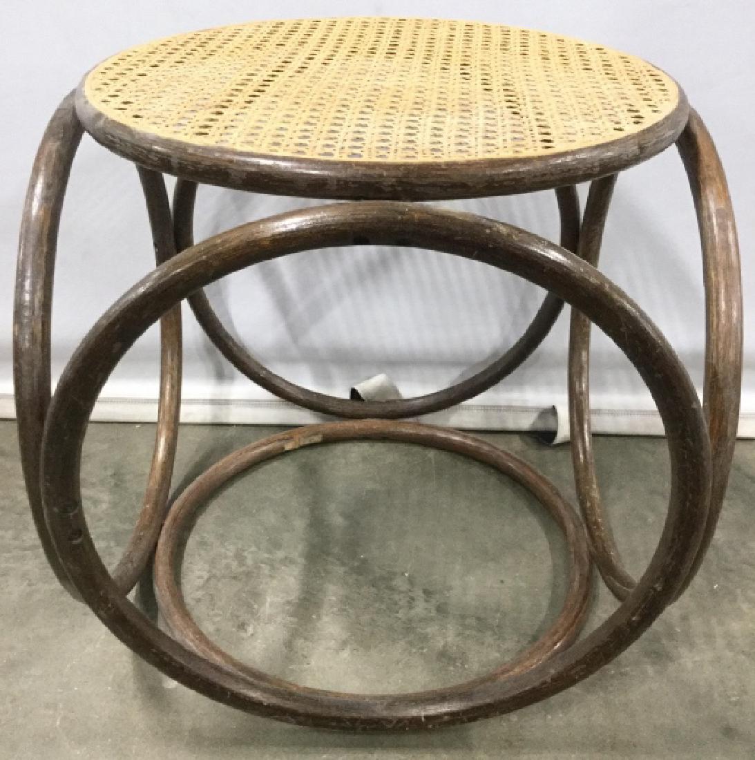 Bent Wood Bench W Caned Seat: Seat of piece is Caned. Structure of piece appears to be bentwood. Piece is brown and tan toned. Can be re purposed as planter stand. Measures approx 16inches tall wide and deep. home furnishings, sea