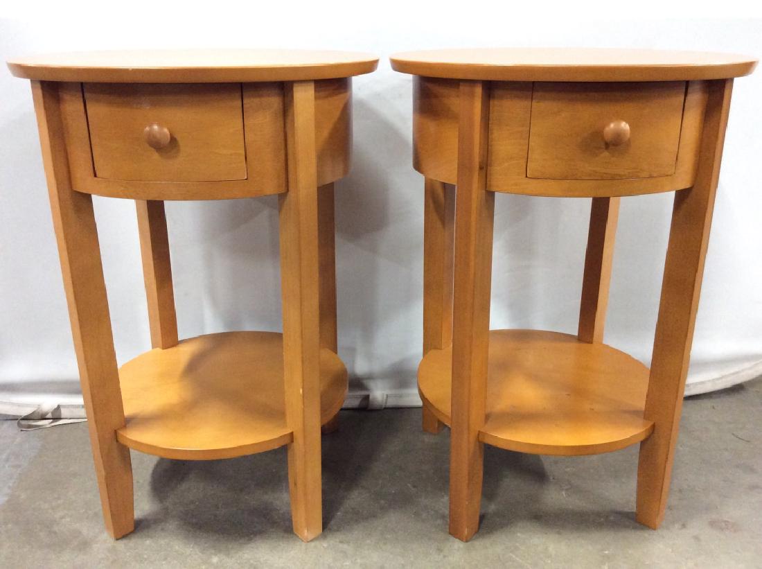 Pair Vintage Round Wooden Side Tables: Side tables are wooden. Each have beige tone. Both pieces are wooden. Each piece has 1 Drawer with knob style. Each table has 4 legs. Each measures approx 28 inches tall 20 inches wide. end tables, si