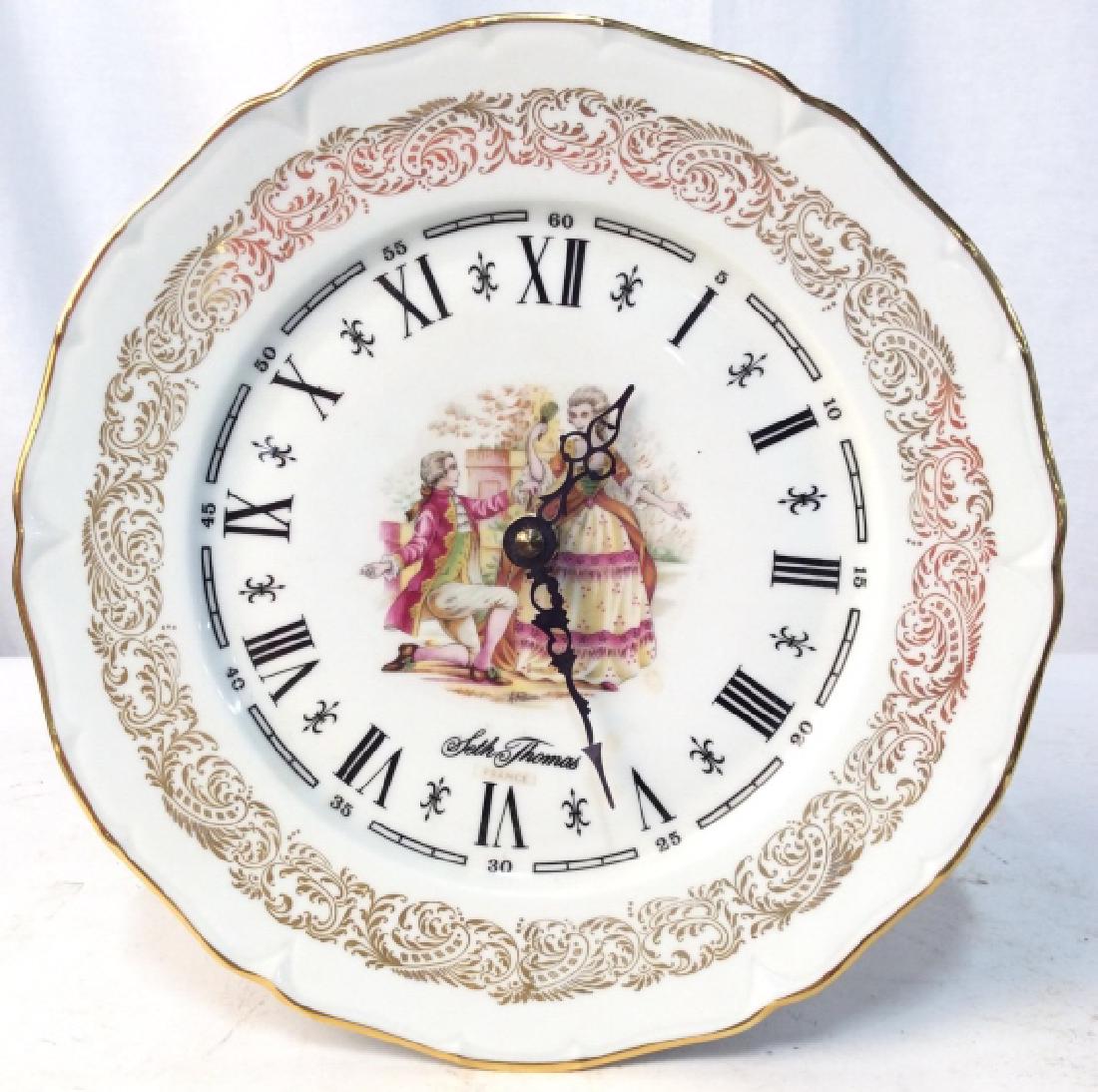 TALLEY INDUSTRIES COMPANY French Plate Clock: Vintage porcelain plate clock with metal hands, and Roman numerals. Gold embroidered trim. Hand painted. Made in France. Plate measures at 10 inches in diameter. French Dinnerware, French Painting, Fr