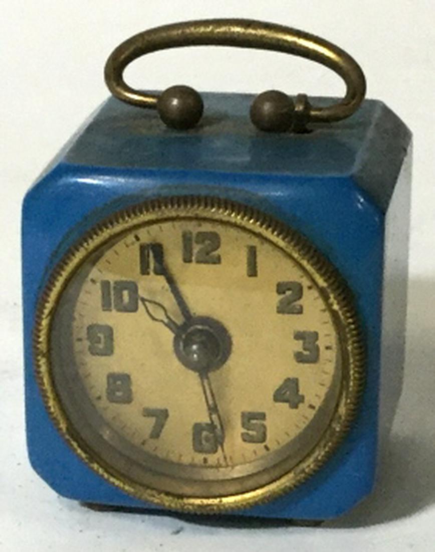 Vintage German Miniature Windup Bedside Clock: Has alarm button, individual hand settings and clock wind. 1.5 in. sq. Is not in working condition. Vintage Mini Clock, German Bedside Clock, Alarm Clock, Wind Up Clock, Tabletop, Clock Collectibles, 