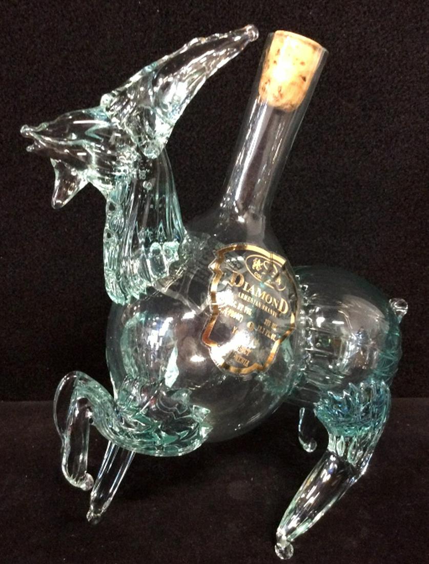DIAMOND Armenian Brandy Deer Art Glass Decanter: Art Glass Sculptural Decanter Of horned animal, appears to be clear handcrafted art glass, measures app 9 in by 7 in by 4 in. Decanter, Vessel, mantelpiece decor, Animal statuary, collectible. 4