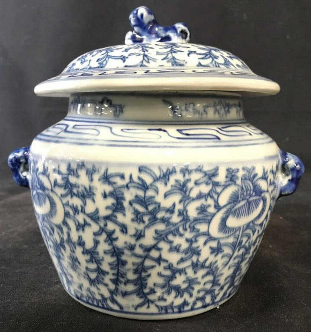 Asian Style Blue & White Toned Ginger Jar: Piece is blue and white toned. Contains blue toned leaf and vine detail. Piece includes lid. Measures approx 6 inches wide 6.5 inches tall. Tableware, decorative arts and accessories, home accent and 