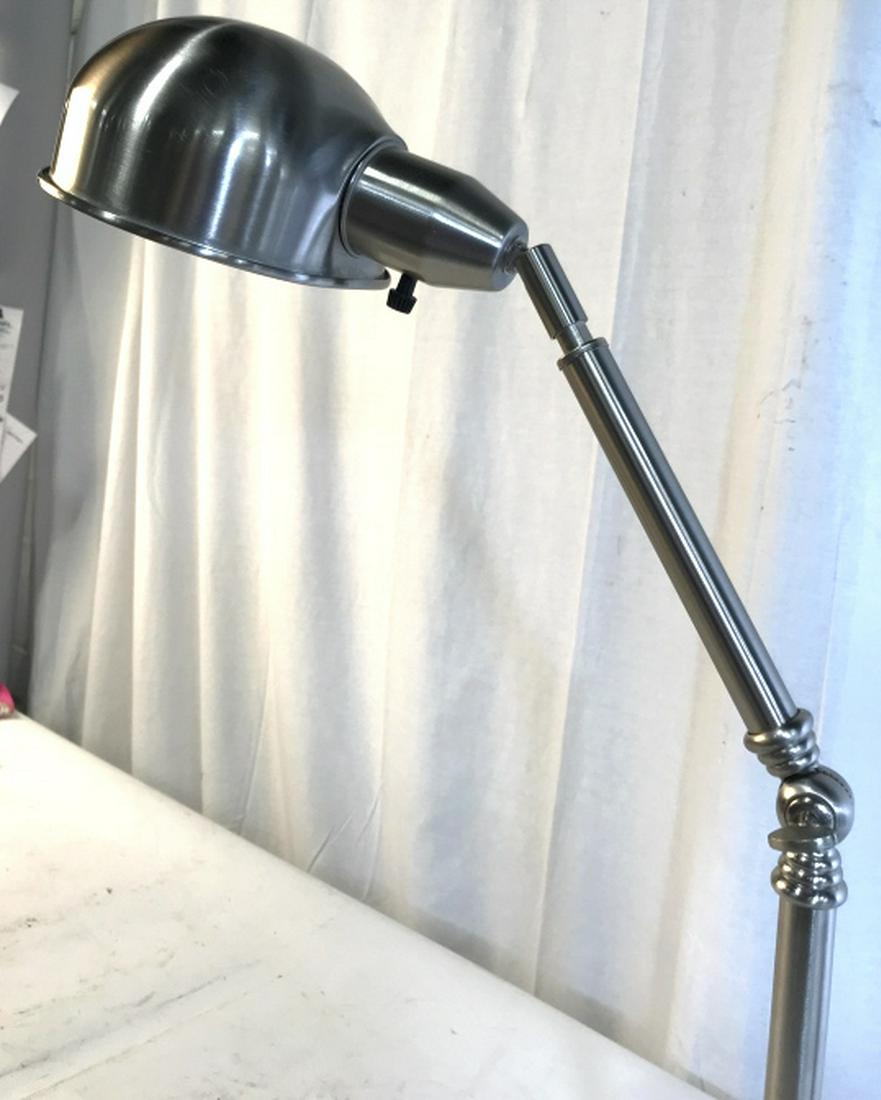 Brushed Chrome adjustable Arm Task Lanp: Desk lamp, adjustable arms ht as shown app 25 inches base diameter app 8 inches home lighting, office accessory