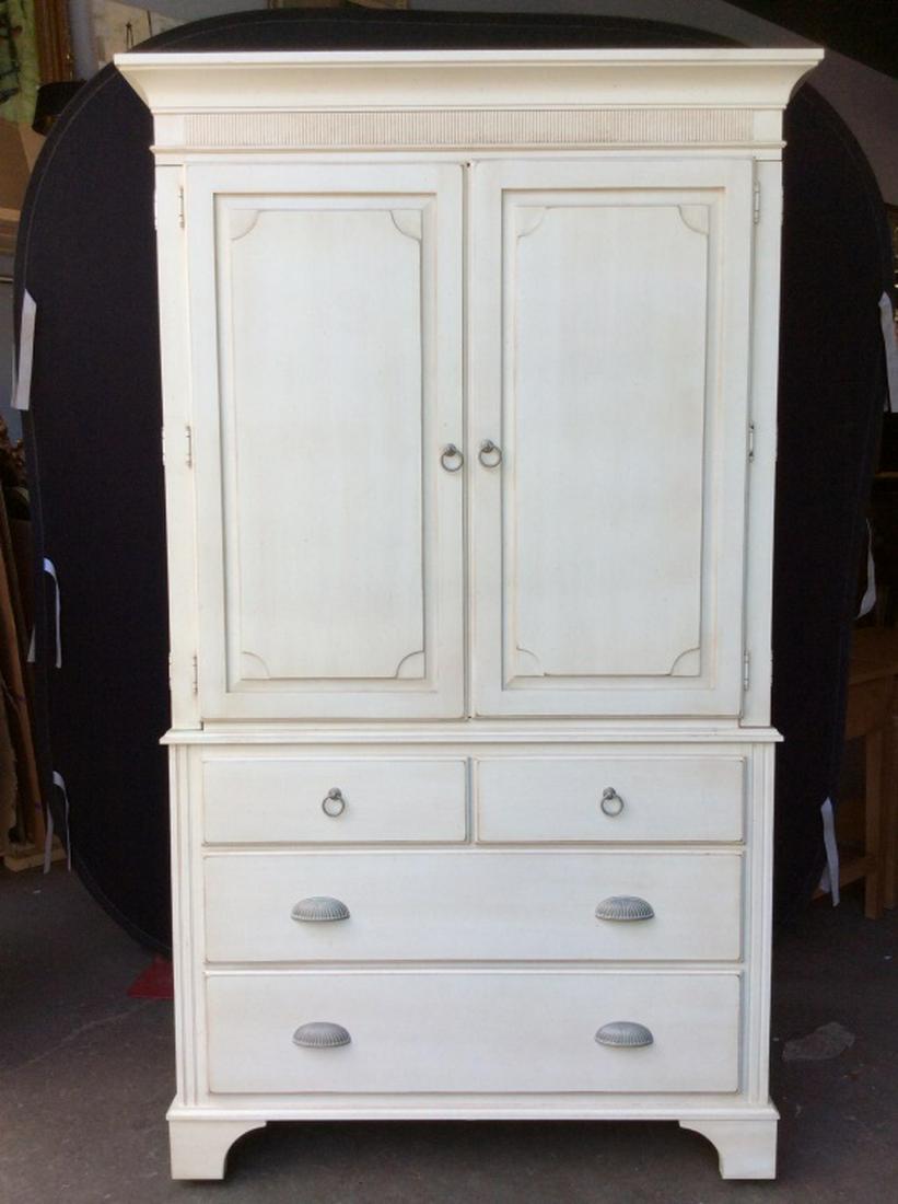 ETHAN ALLEN Cream Tone Wooden Dresser: Top left drawer marked for Ethan Allen in interior. Dresser has top half 2-door cabinet with shelving. Shelves need reaffixing. Top cabinet has opening in the rear for wires. Bottom half has 4 drawers