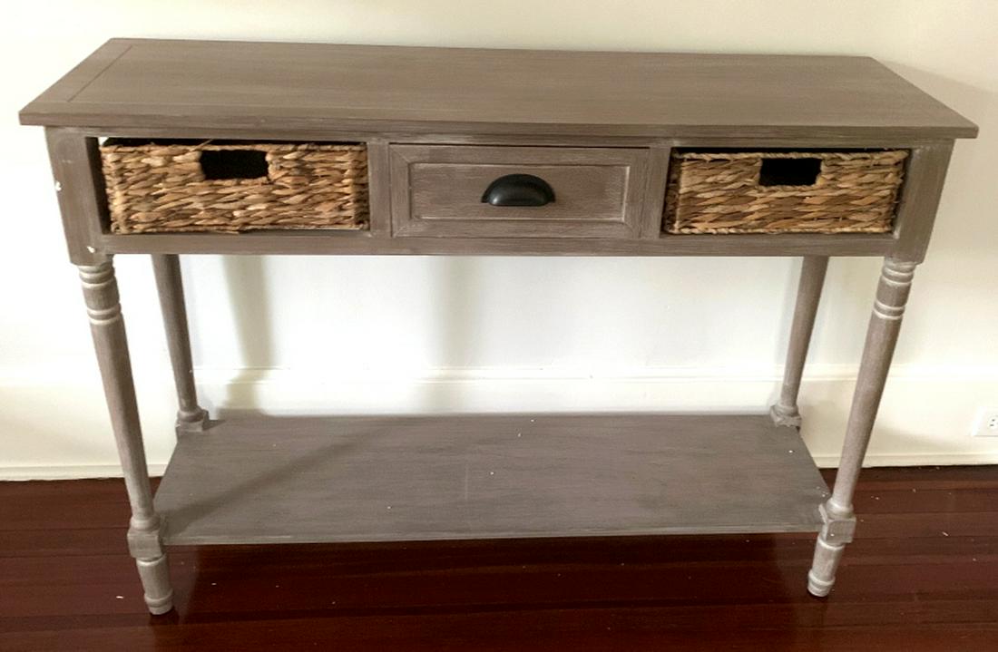 Wooden Console Table W 2 Baskets & 1 Drawer: Console table has slate brown tone & 4 legs. Piece includes 2 baskets which fit on each side and 1 drawer. Piece measures approx 45 inches long 32 inches tall 14 inches deep. 6