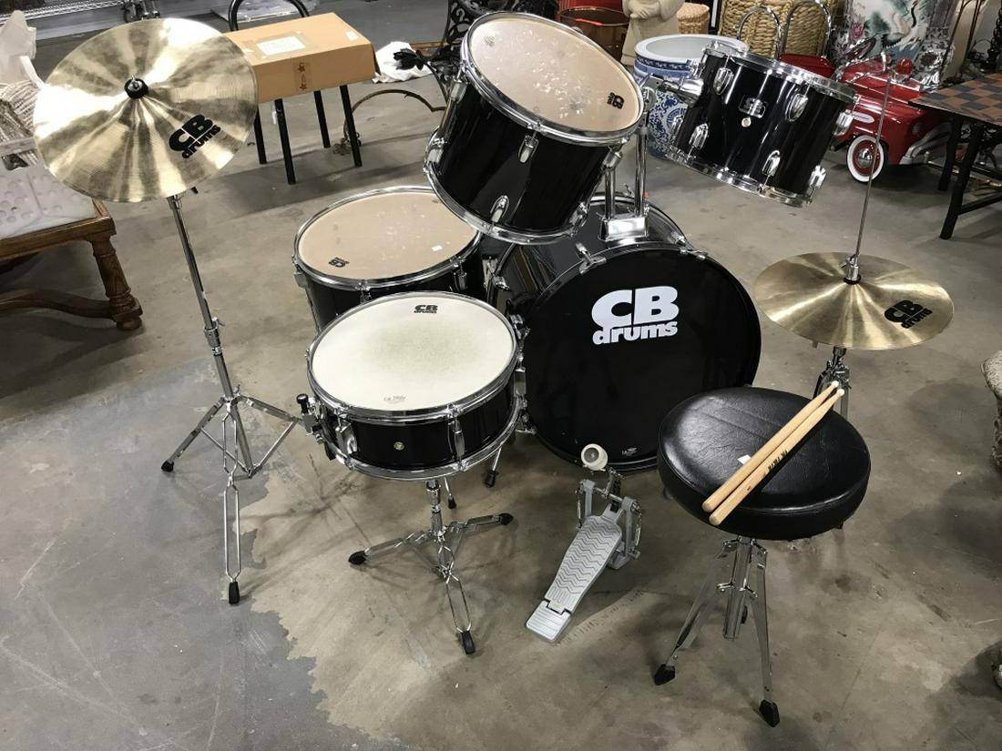 Set 9 CB Drum Set Series: Set 9 CB Drum Set Series, serial number on largest drum 220241, made in China, set consists of five drums of different sizes, two symbols w metal stands, stool, base drum pedal and sticks. In very goo