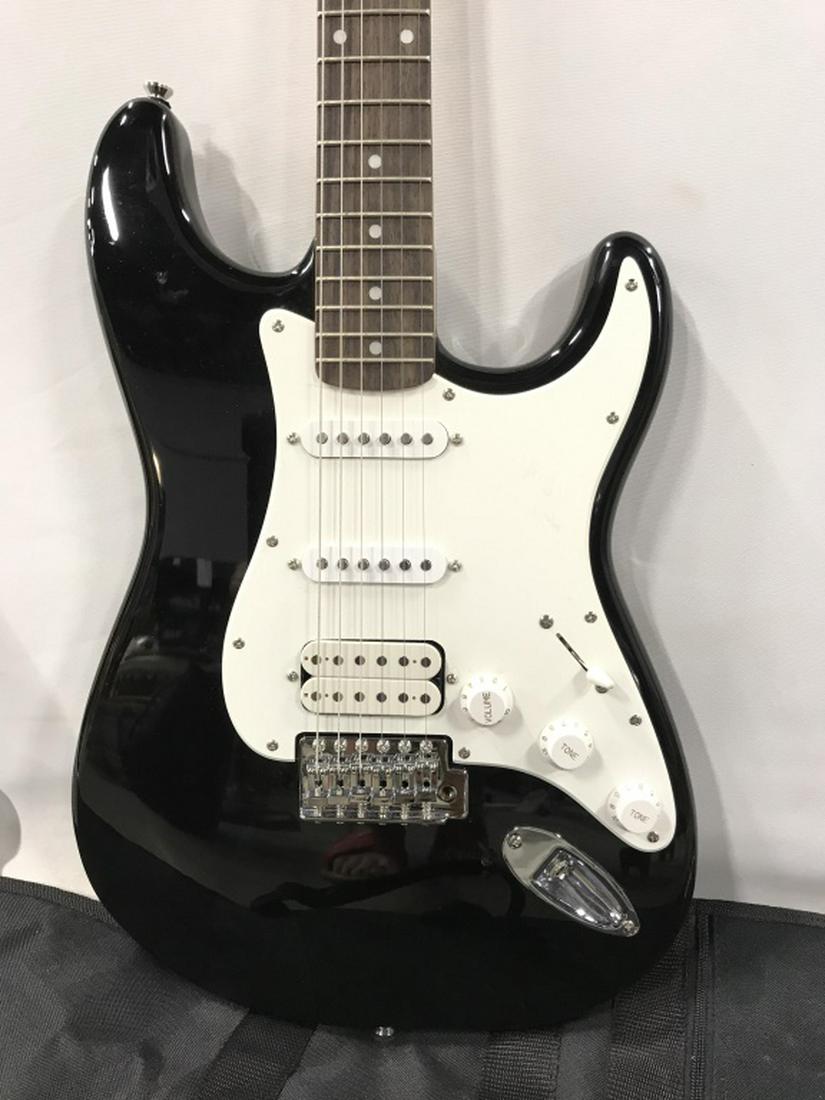 Set 2 Fender Squire Strat Electric Guitar & Amp: Set 2 Fender Squire Strat Electric Guitar & Fender Frontman 15 G Amplifier, not tested, guitar comes with soft case. Guitar measures approx 39 inches long x 12.5 inches wide. Musical Instruments, Elec