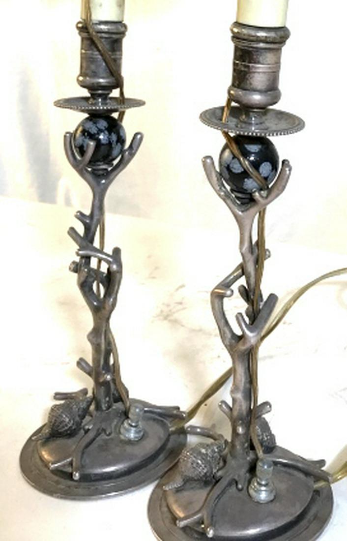 Pair Silver Toned Beach Motif Lamps: Turn Switch, thin light bulb screw in, flexible cord, no shades, silver toned shells and drift wood on base and stem. One lamp leans, missing bottom plate, exposing wiring. Other lamp has wobble mid w