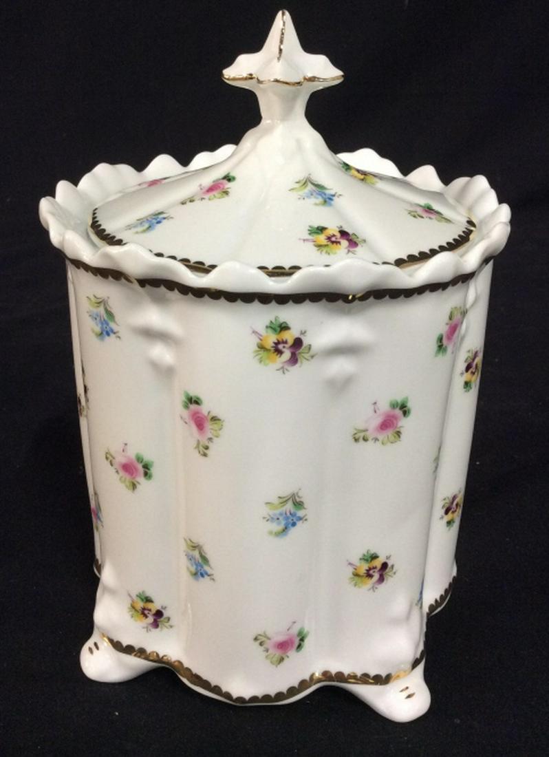 Godinger CO Porcelain Footed Vessel with Lid: Decorative porcelain footed vessel with floral painted detailing and gold trim. Measures at approx 8 inches tall, and approx 5 inches in diameter. Porcelain dish, sugar holder, Kitchenware, floral dec