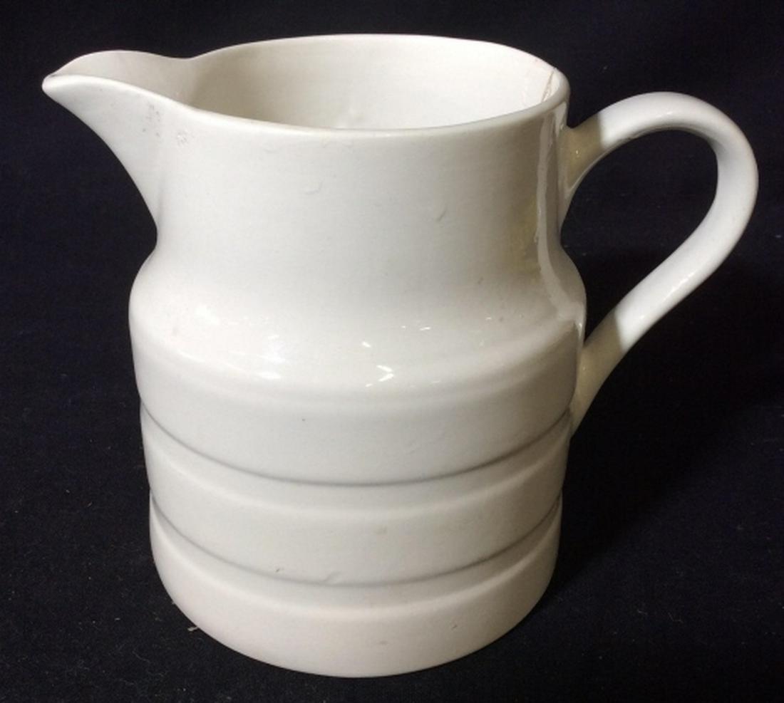 LORD NELSON Porcelain Pitcher: Vintage Lord Nelson white Porcelain textured pitcher. Slight chip inside (hardly noticeable). Pitcher measures at approx 6 inches tall, and approx 5 inches in diameter. Vintage porcelain, porcelain di