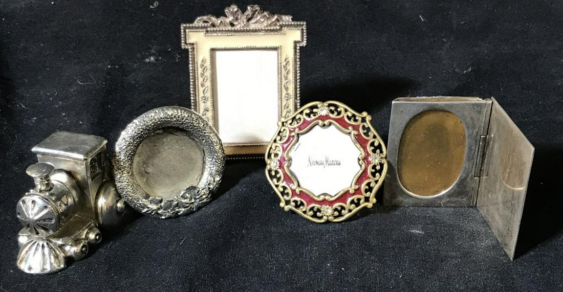 Lot 4 Vintage Miniature Picture Frames: Silver Toned and Enameled. Two with a round shape, one oblong and one rectangle. Train made in Italy. Has no glass or plastic barrier. Same for tall enamel frame. Image size Sizes: 1 1/8 x 1.5, 1.5 di