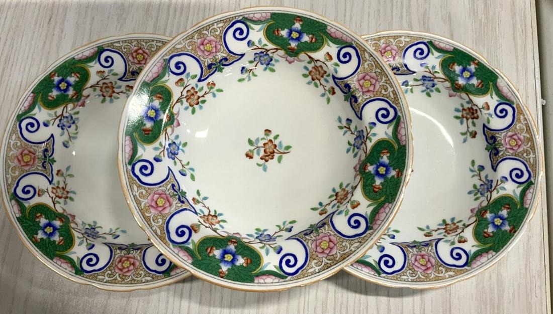 Minton Porcelain Dinner Service Set: Intricately detailed with floral and geometric patterns, Plates marked for Davis Collamure & Co & Ltd, Broadway and 21, New York, set includes serving platter length app 12 inches, lidded tureen app h