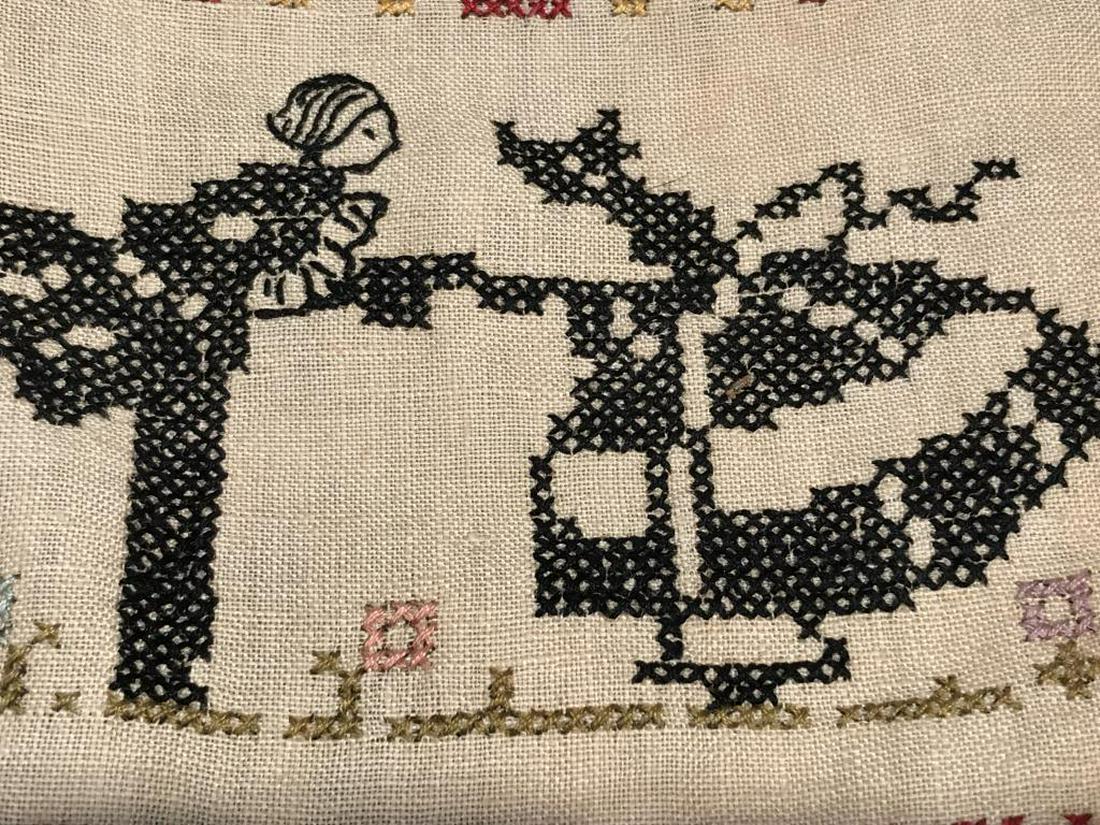 Vintage Colonial Motto Sampler, Welcome Friend: Sampler features the saying ‘welcome, friend. Glad you came hope so much you’ll feel the same.’ Embroidered figures in suit and dress with floral pattern border. Sampler is set in wood frame. Fr