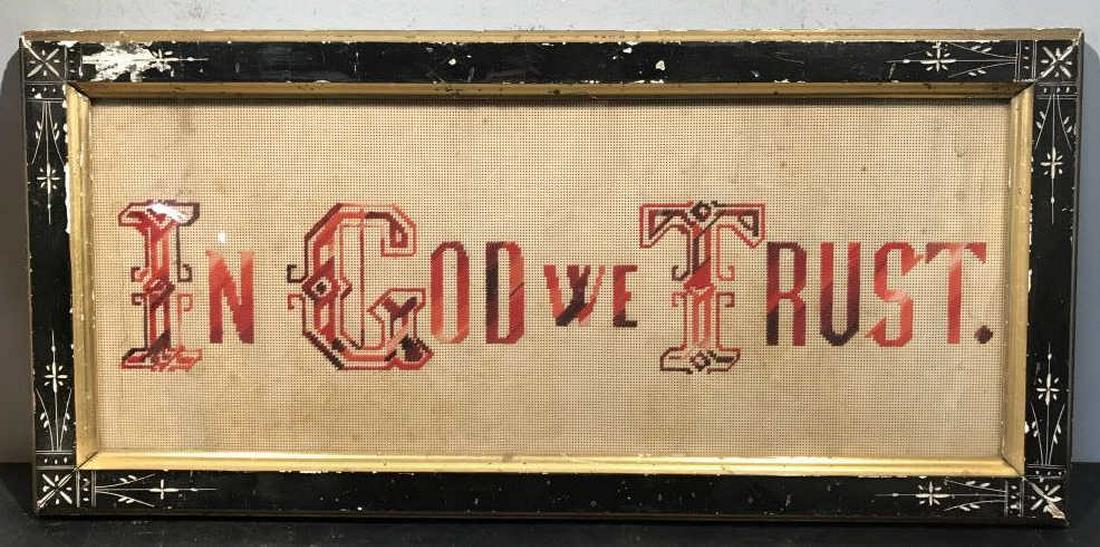 Vintage Embroidered Wall Art, In God We Trust: Vintage embroidered wall art, thread on paper, reads ‘in god we trust.’ Embroidery is set behind glass in antique style wood frame. Measures approx 11 inches in height by 23.75 inches in width wit