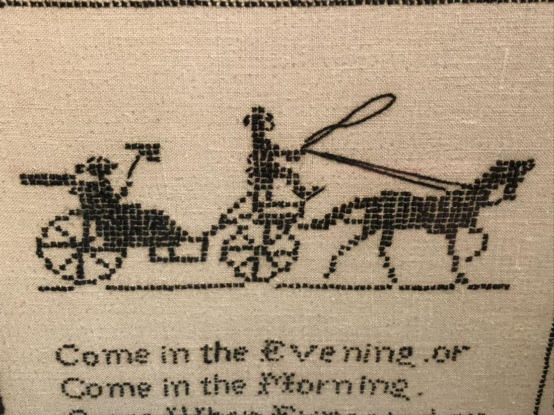 Vintage Motto Sampler W Horse & Buggy Motif, 1930: Sampler features the saying ‘come in the evening. or come in the morning. Come when expected. Or come without warning.’ Embroidered silhouette of horse and buggy silhouettes with floral pattern bo