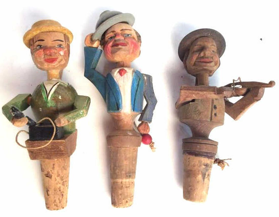 Lot 3 Vintage Folk Art Wine Corks: Appears to be handcrafted, painted Carved wood Figurals, all gentleman with moveable feature, one lifting telephone, one tipping his hat, one playing the violin, some surface wear appropriate to age, 