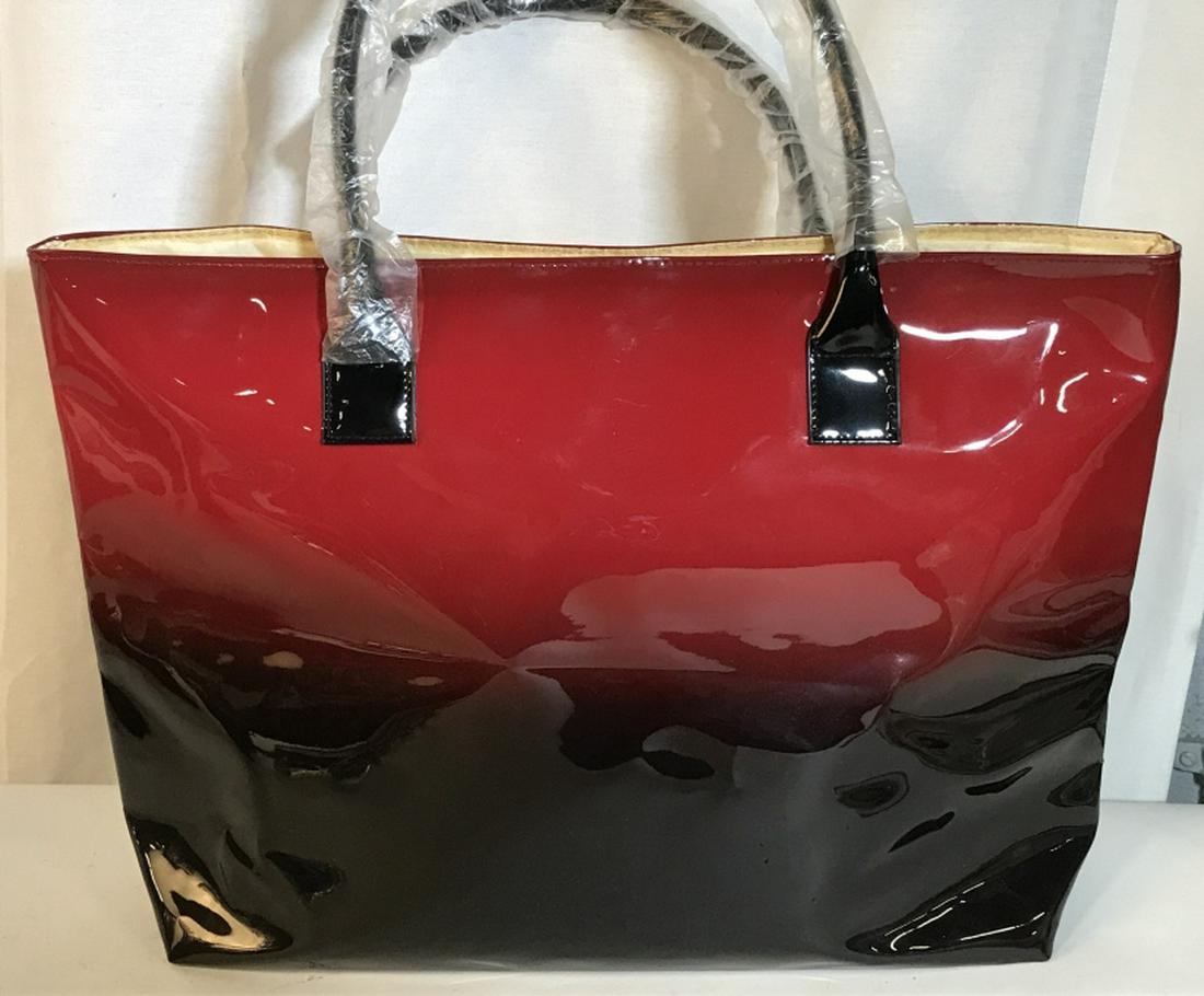 ELIZABETH ARDEN Large Tote Bag: Never Used. PVC Exterior. Polyester Interior. Snap Closure. Handles, 7 in. Rise Tote, approx 19.5 x 12.5 x 5 in. A couple sections material is not uniform - from being folded up. See pictures. Elizabe