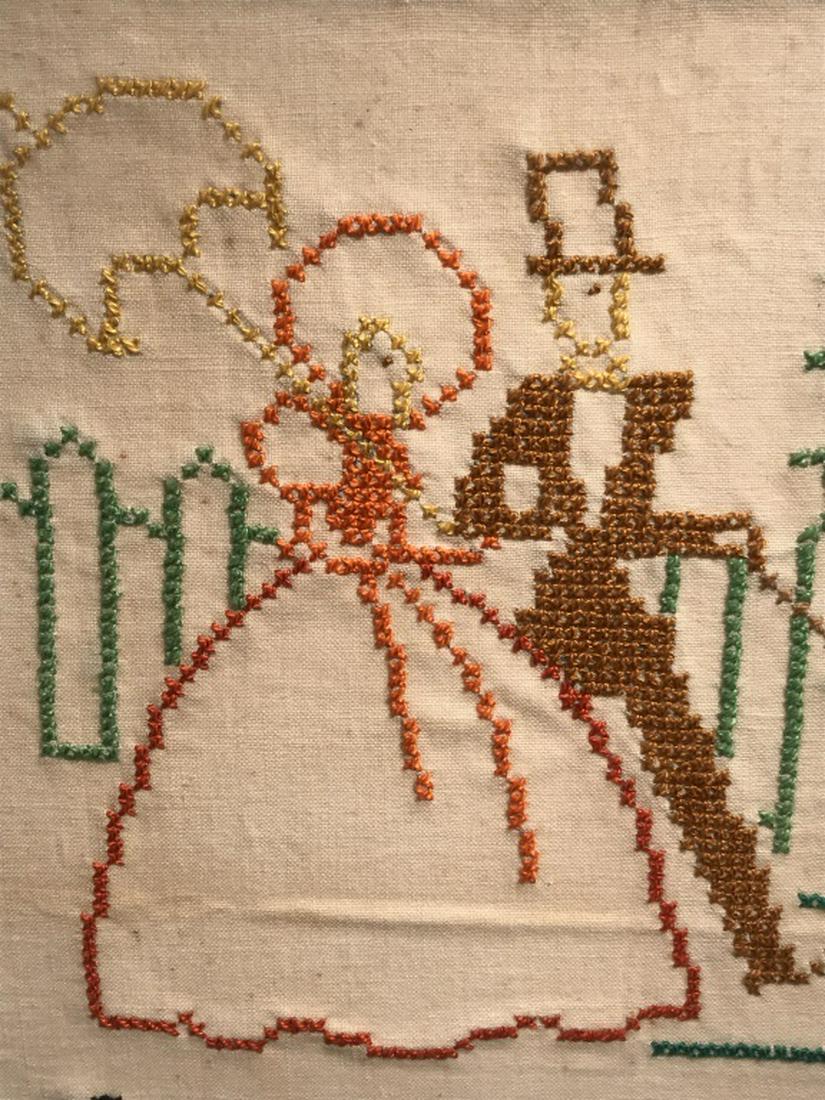 Vintage Motto Sampler W Couple Motif: Sampler features embroidered couple walking along street, along with the saying ‘come in the evening, come in the morning, come when expected, or come without warning.’ Pattern border. Sampler is