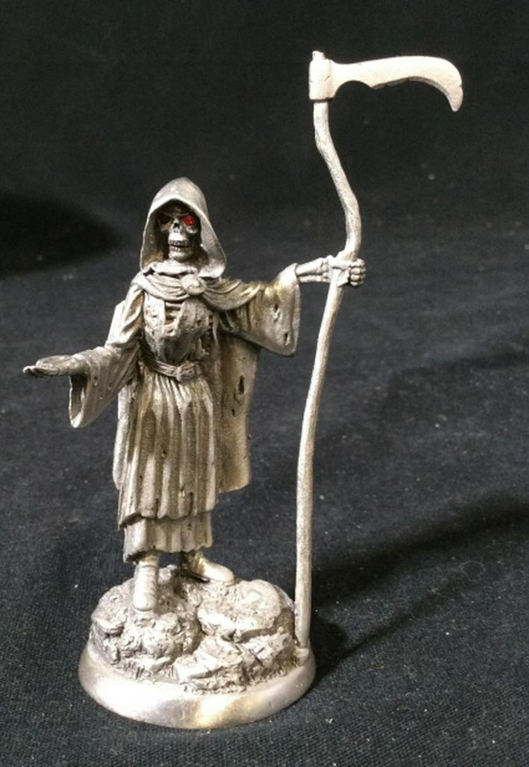 BOB OLLEY 1995 Metal Grim Reaper Figurine: Vintage 1995 Bob OLLEY metal stamped grim reaper Figurine with red jeweled eyes. Grim reaper Figurine measures at approximately 4 inches tall, and approximately 2.3 inches wide. Figurine, grim reaper 