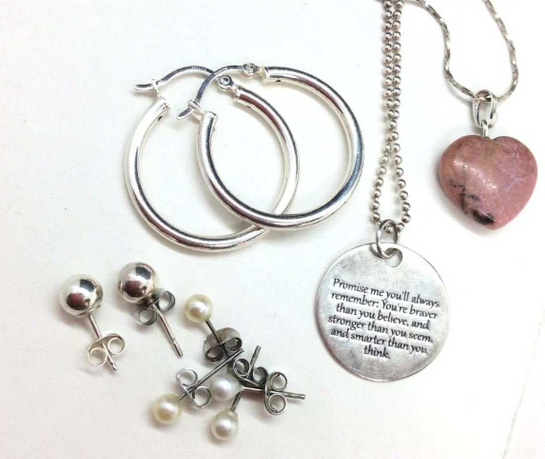 Group Lot Sterling Jewelry And More: Two pairs of small pearlescent style post earrings, one pair of metallic ball post earrings, one hoop set, one necklace with Winnie the Pooh quote Charm, one natural stone heart charm necklace. Some p
