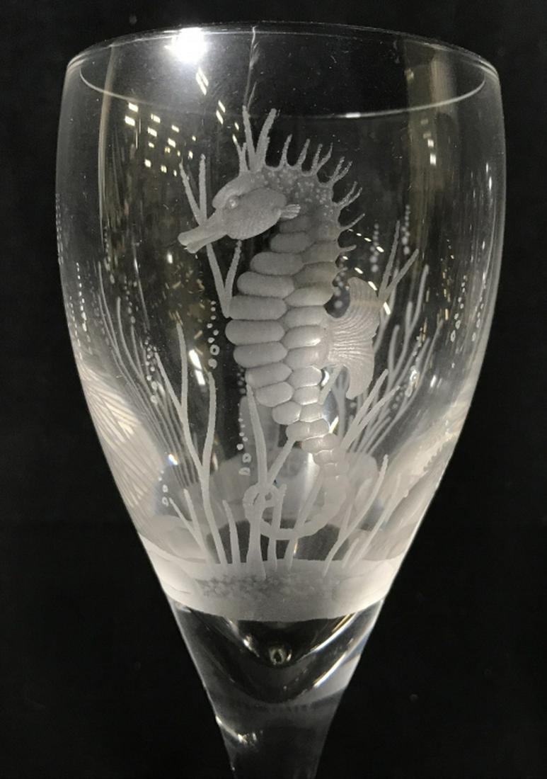 Lot 4 Signed Crystal Stemware W Etched Seahorse: Lot 4 Crystal Stemware Wine Glasses With Etched seahorse & Seaweed designs. Signed ‘SPC 2004’ below etched designs. Each measures approx 9.4 inches in height by 3 inches in diameter at opening. No