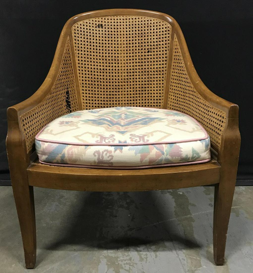 BAKER FURNITURE Caned Curved Back Chair: Label on underside reads for Baker Furniture. Chair has caned curved back and seat. Includes removable seat cushion. measures approx 31.5 inches in height by 24 inches in width by 20 inches in depth.