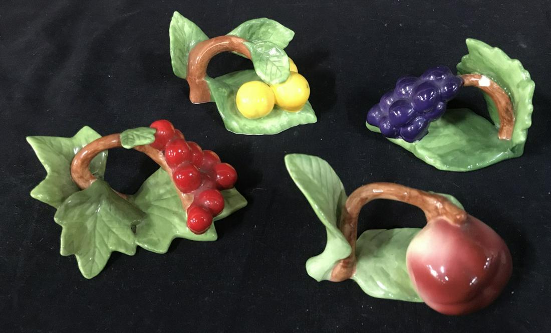 Set 4 Bone China Fruit Themed Napkin Rings: Set 4 Bone China Hand Painted Fruit Themed Napkin Rings, Measures approx 4 inches wide x 2 inches tall, chip to one napkin ring, marked on underside Fine Bone China Made in Philippines. Table Setting 
