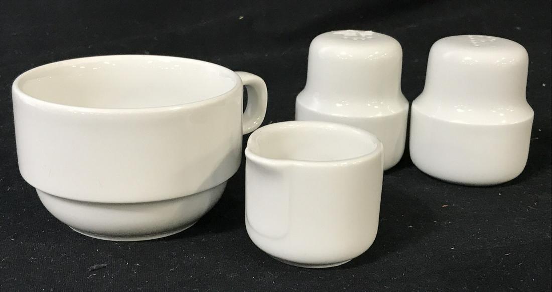 Lot 4 German Porcelain Tableware: Schonwald tea cup and creamer, stamp marked on underside. Salt & Pepper shaker, not stamp marked. Cup, 4 in. W x 2 in. H. Tableware, German Porcelain Tea Cup & Creamer, Salt & Pepper Porcelain, Tablet