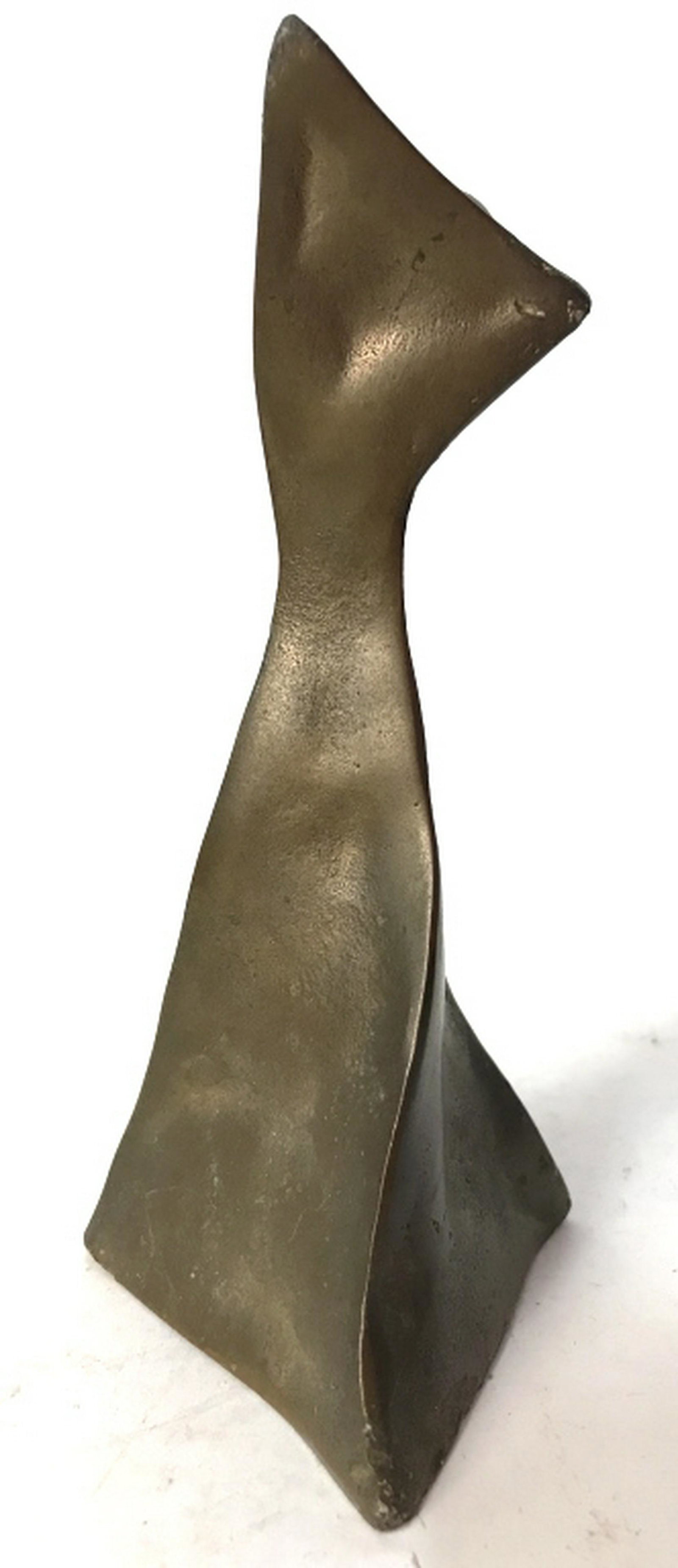 Signed Bronze Abstract Sculpture Sculpture appears to: Sculpture appears to be bronze. Piece is signed on lower area. Measures approx 6.5 inches tall 2.5 inches wide. tableware, home decoration, sculptural art, tabletop accessory 6.