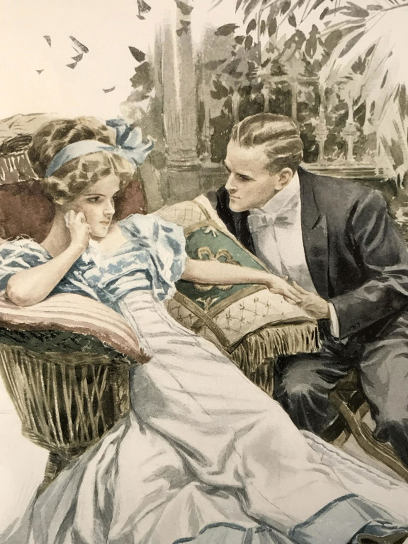 Framed Harrison Fisher Print from Garden Of Girls Print: Print depicts seated woman and man. Print is matted and set behind glass in painted carved wood frame. Verso has label for ‘Harriet Pirk' Antique Print Seller, Harrison Fisher 1910 Page 248’ along