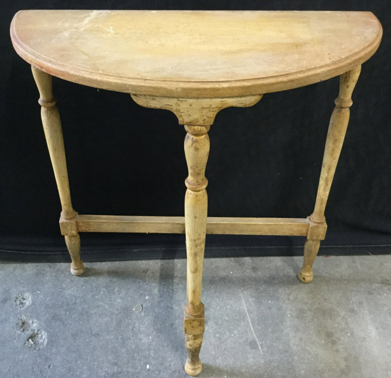 Vintage Half Circle Carved Wooden Table Table is wooden: Table is wooden appears to be vintage. Legs Contain Carved Wooden Detail. Piece has evident wear. Measures approx 24 inches tall and long 12 inches deep. home accent and accessories, home furnishings,