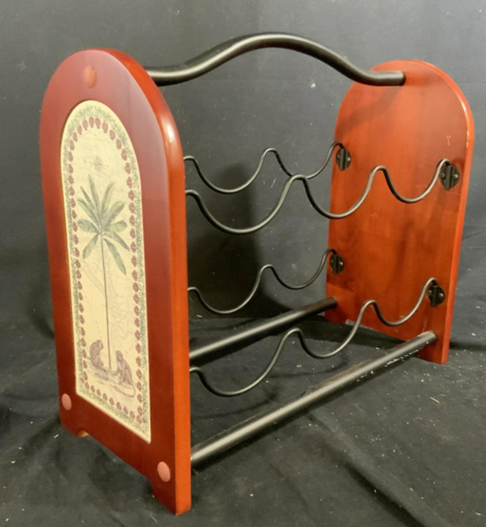Wine Rack w Monkey Design: Measures app ht 14 inches by length 12 inches , holds six bottles, kitchen accessories, home decor and accessories, countertop display and decor