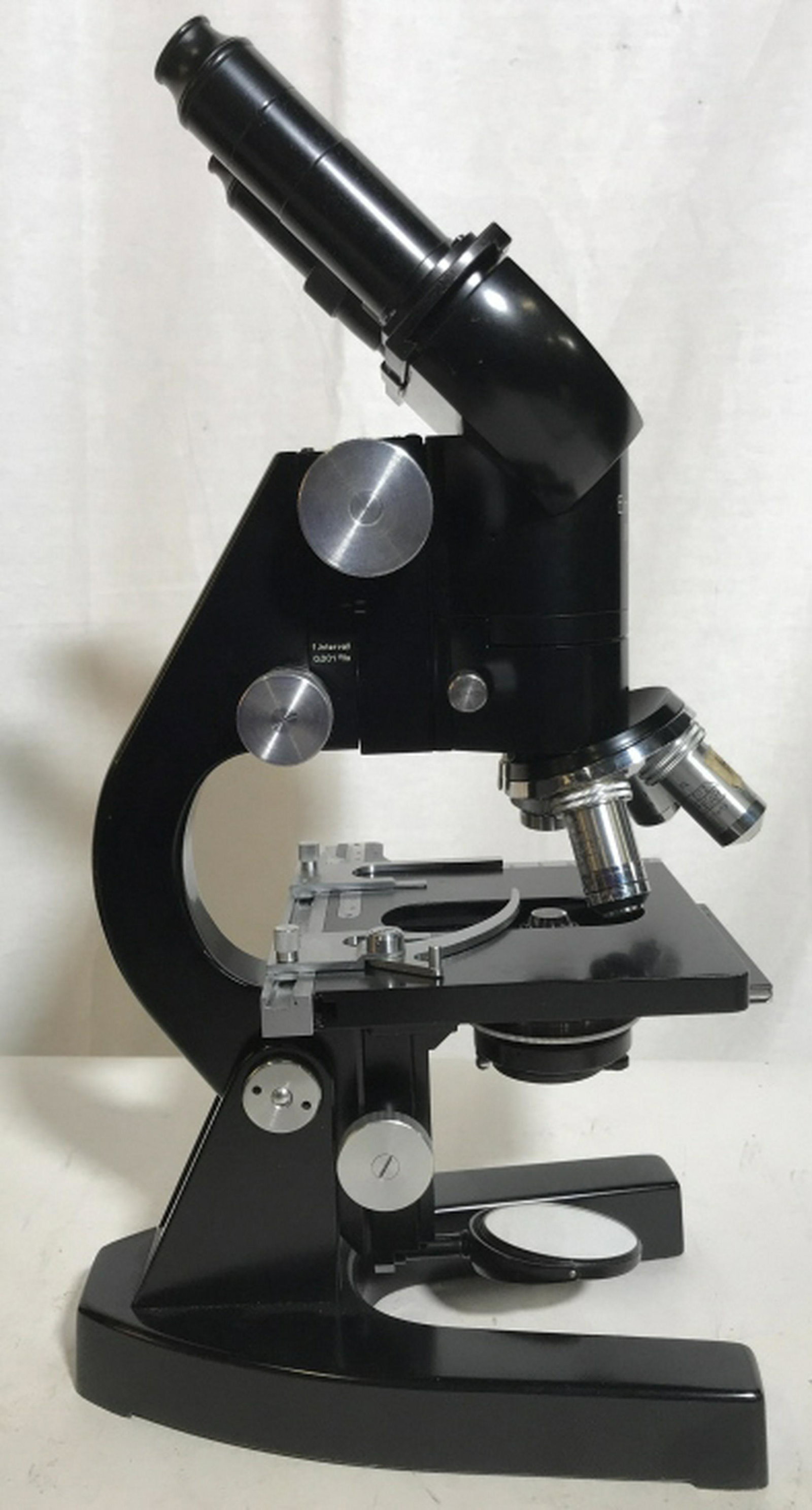 Vintage Ernst Leitz Weltzar Germany Microscope: In Original Box- Age unknown, possibly 1950s- Sticker on box gives Co. Name ‘A. Waeldin Inc service # F6322’. Box measures 16 x 9.5 x 9.5 approx. Latch toggle locks, no key, Specimen bottles, box 
