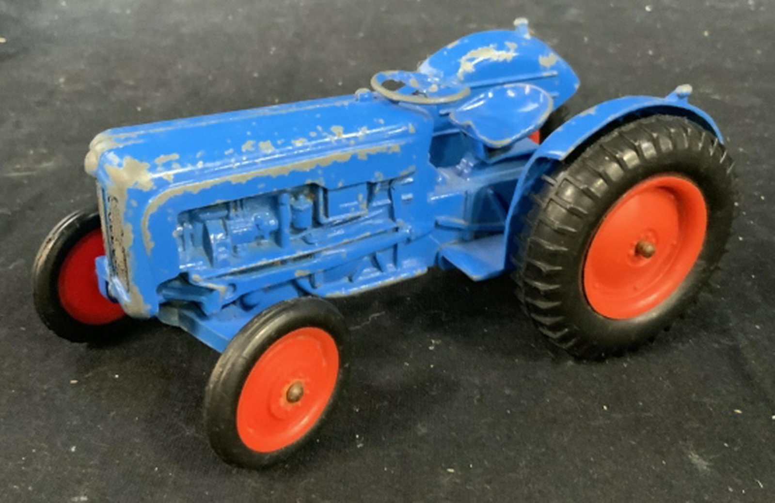Vintage Metal John Deere Tractor Toys: Three pieces, painted metal, collectible toys, longest measures app 10 inches