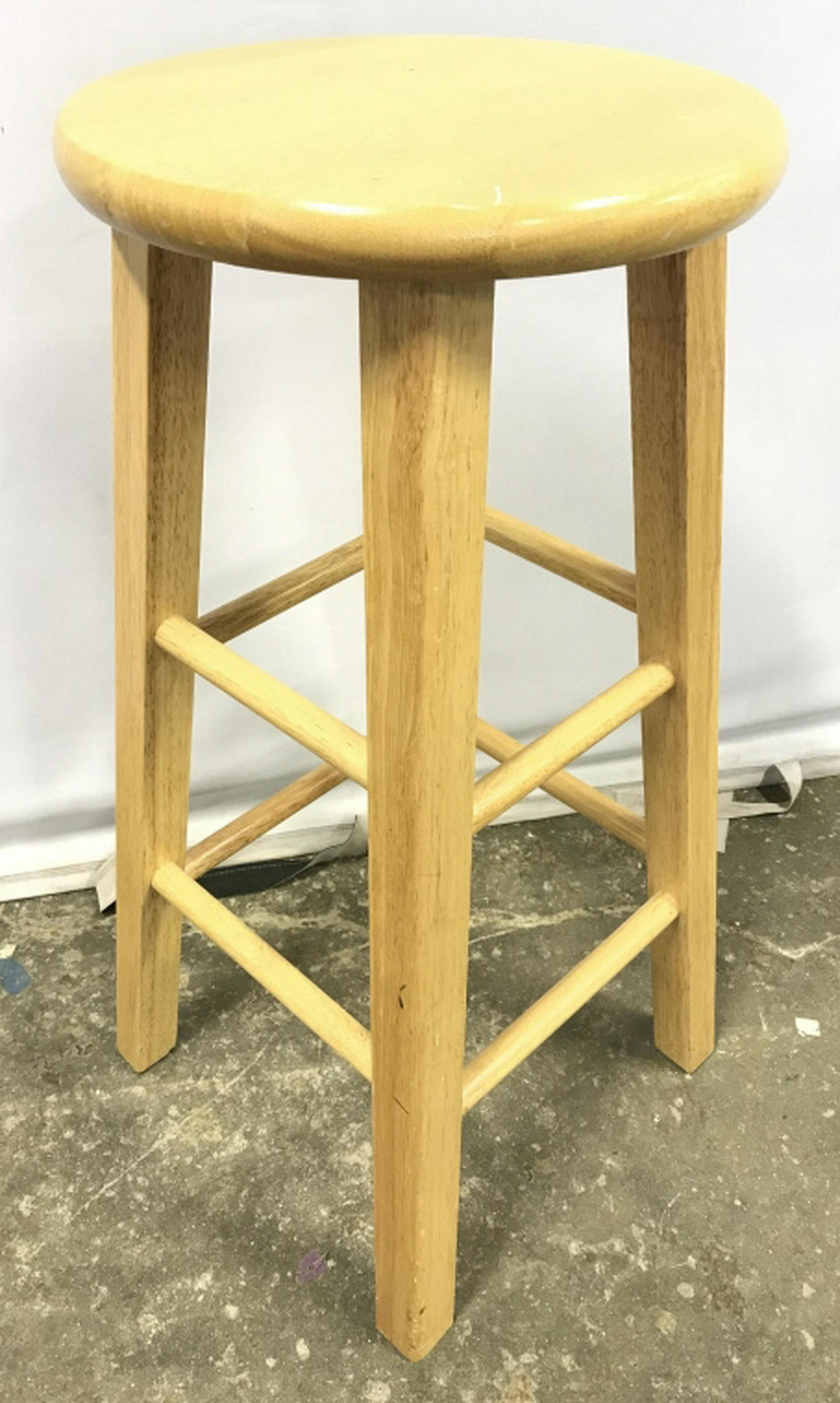 Tan Toned Wooden Stool: Stool is tan toned. Piece has round shape seat. Piece measures approx 29 inches tall 13 inches wide. stool, seat, home accent and furnishings 6x