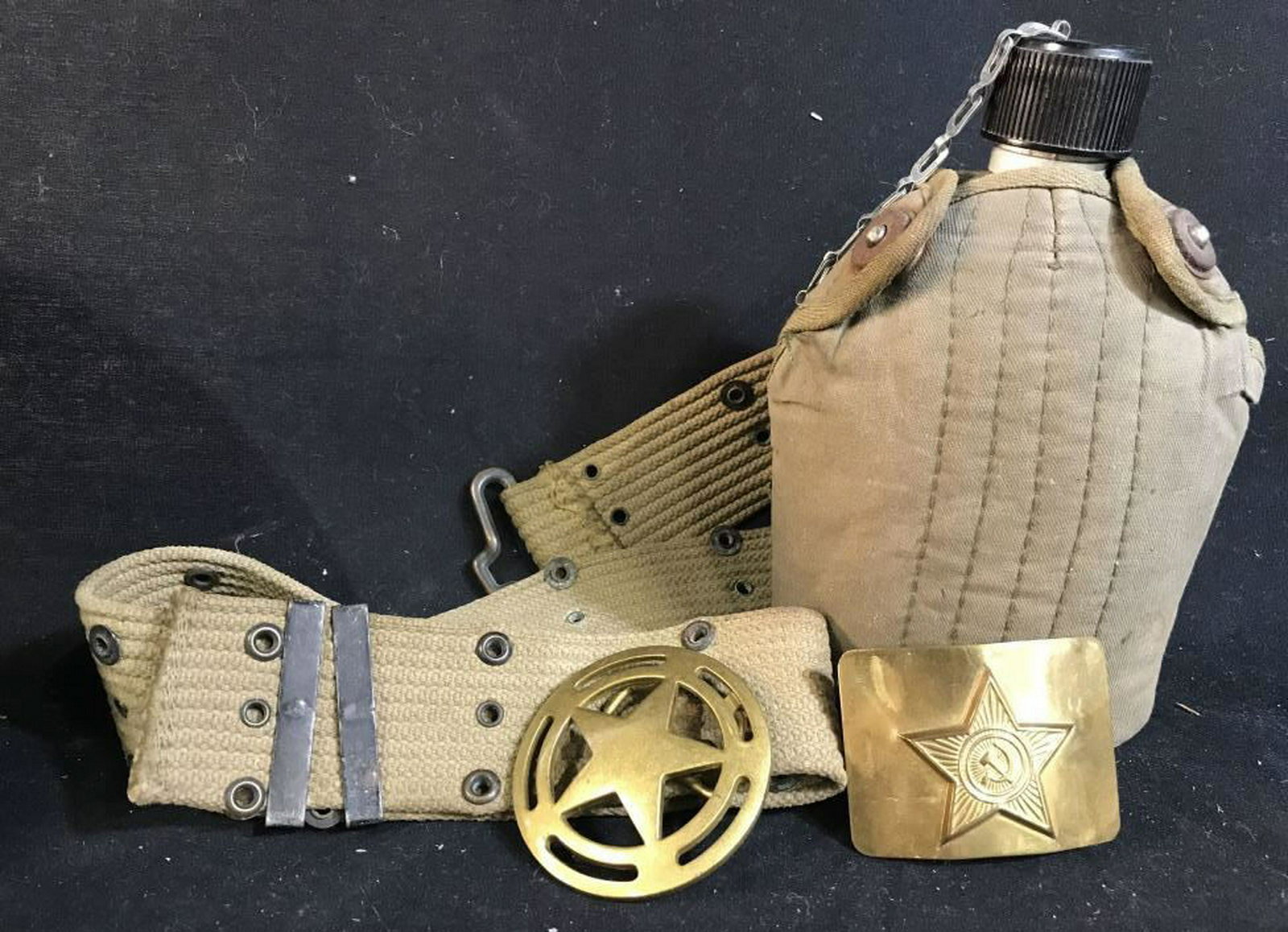 Vintage Canteen w 2 Russian Belt Buckles: One brass belt buckle with center star design, second with hammer and sickle in center star design, canteen in carry pouch with harness ht app 8.5 inches, collectibles
