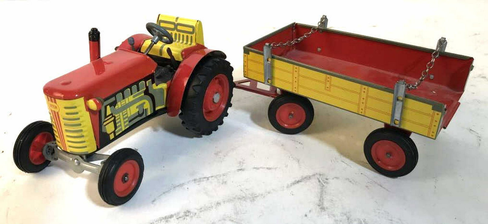 Vintage Red Yellow Metal Toy Tractor: Tractor attaches to pull wagon together length app 15 inches, collectible toy tractor, metal toy