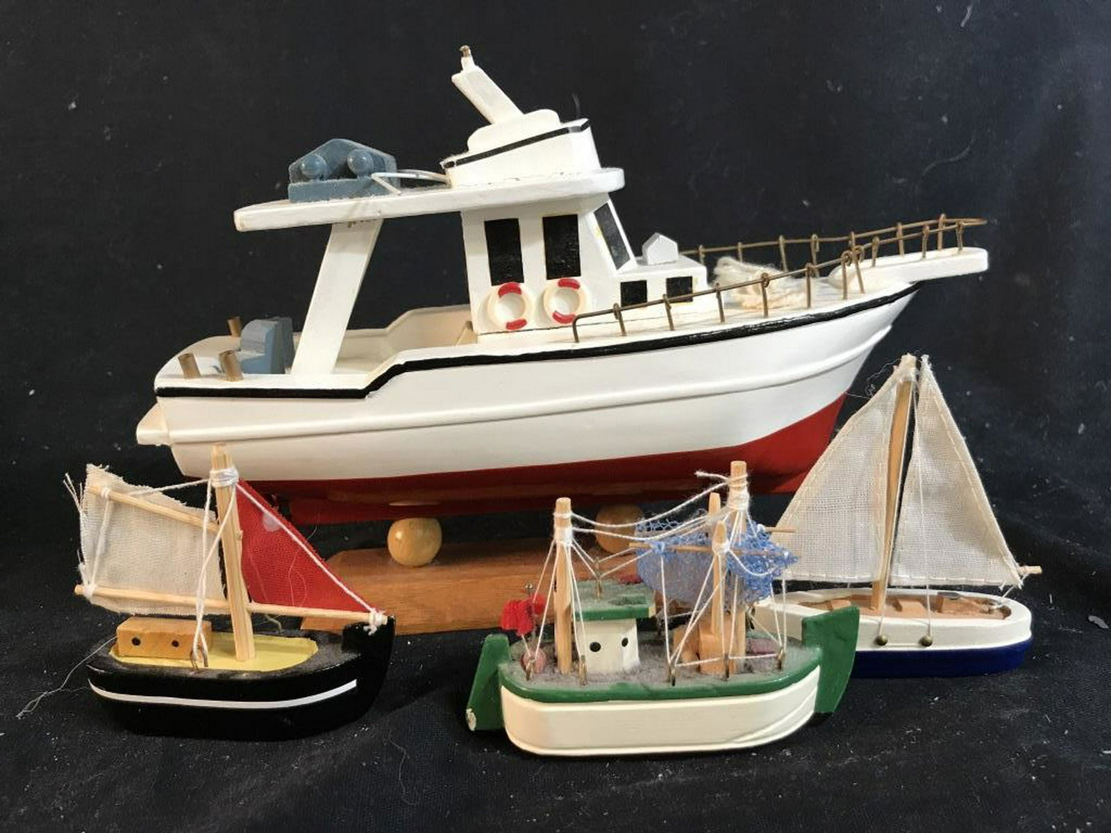 Group 4 Model Boats: Three miniatures, one larger measures ht 6.5 inches, decorative accessories, boats, fishing boats, sail boats, nautical, collectible