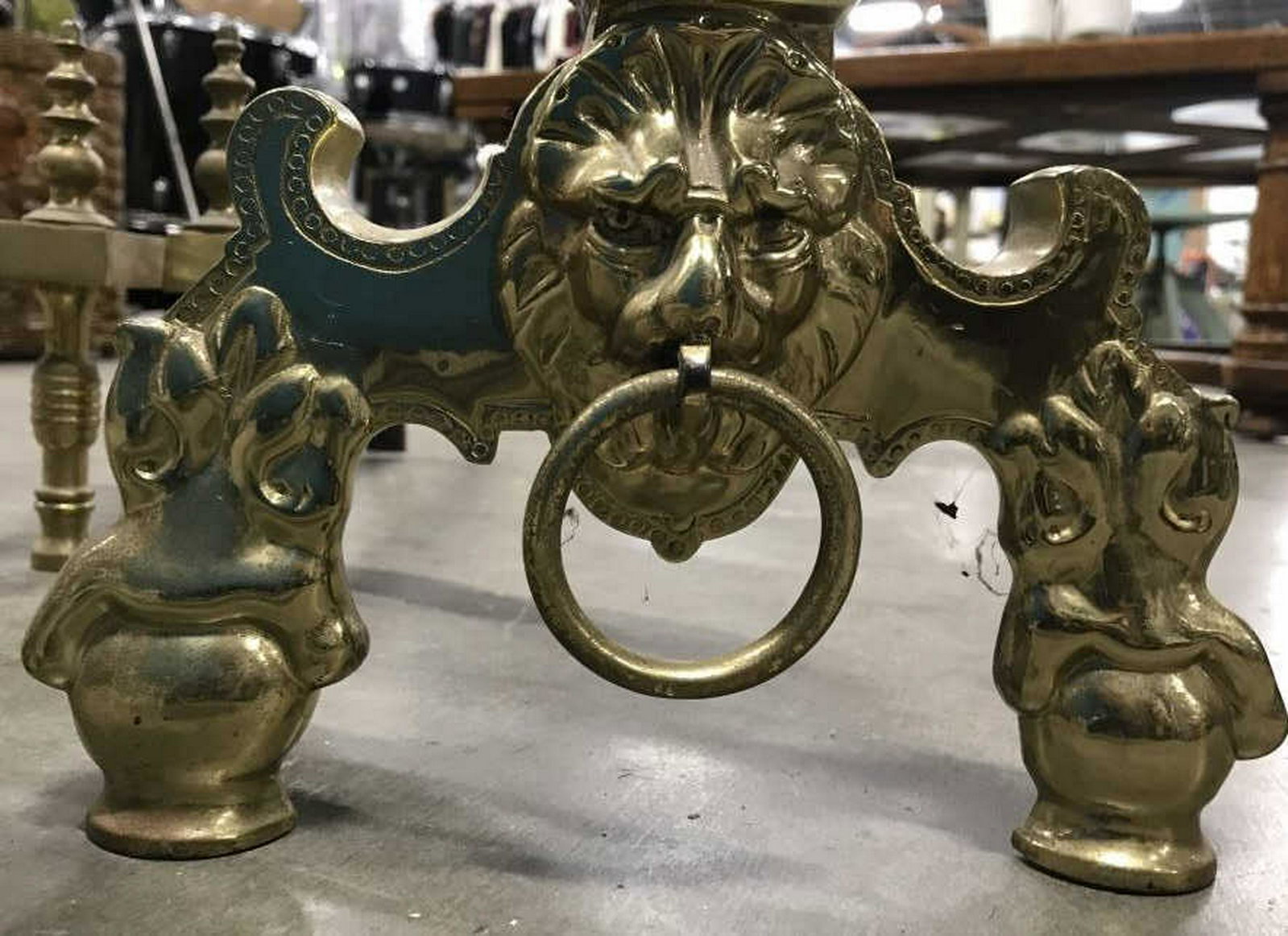 Pair Lion Head Brass Andirons: Statement brass Andirons, fireplace accessories, Lion Head With Ring Details, each Measures ht app 24 inches, width 12 inches depth 27 inches