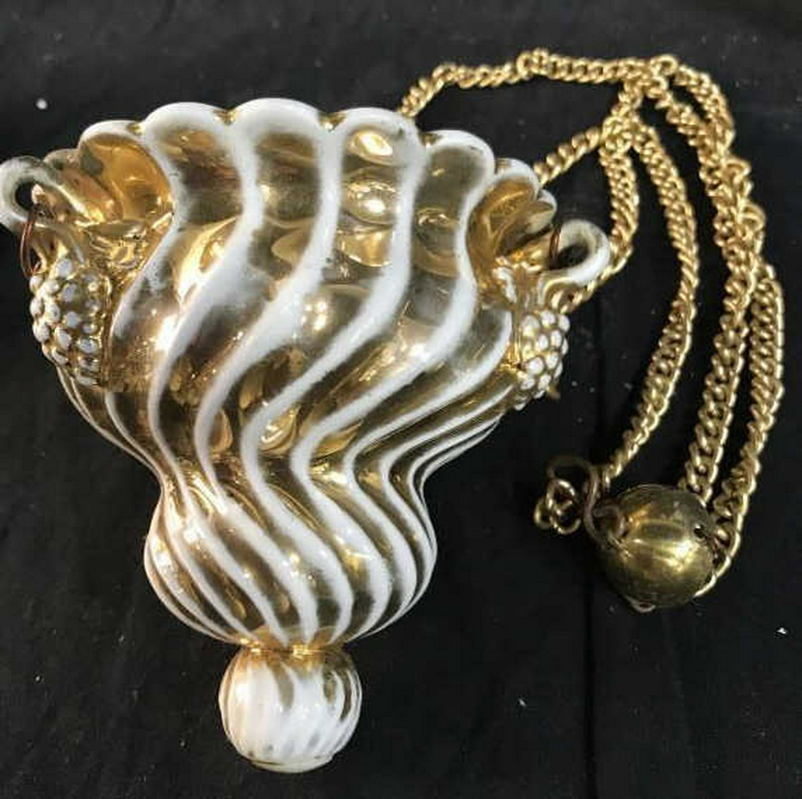 Group Lot Accessories Collectibles Oddities: Lot includes antique metal cow bells wine Decanter and pourer, old picture Washington Framed, hanging brass scale, brass curtain tie backs, brass wall decor, hanging brass censor, hanging porcelain ce