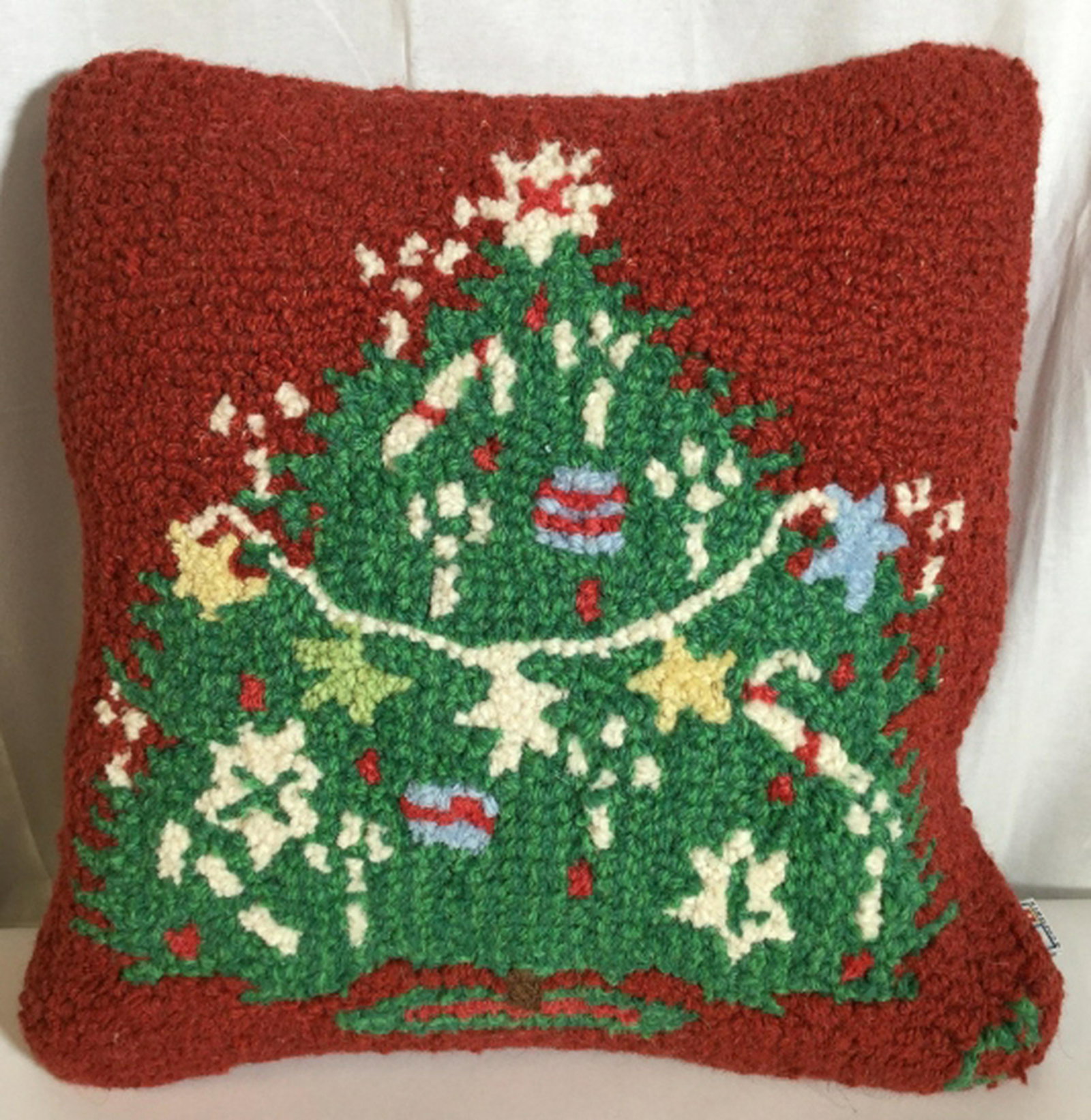Christmas Tree Holiday Decorative Pillow Christmas: Christmas decorative pillow designed by Laura Megro. Christmas tree depicted on the front andflat red on the back. Pillow measures at approximately 20 inches by 20 inches. Christmas pillow, Christmas 