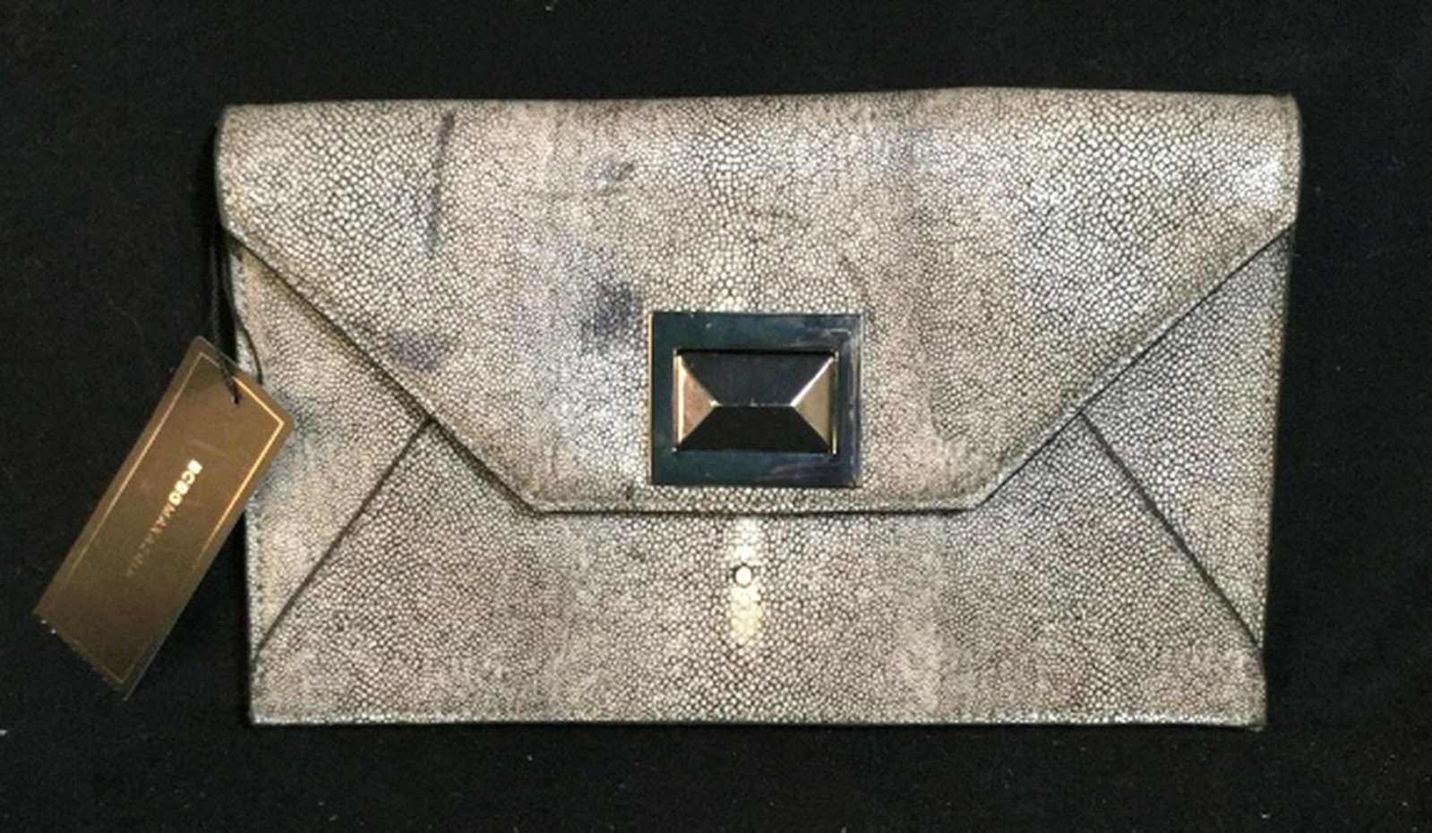 BCBG MAXAZRIA MATTIE CLUTCH in Shagreen style BCBG: BCBG MAXAZRIA MATTIE CLUTCH in Stone color. Shagreen style material. Tag still attached, in very good condition. Wrist strap in original casing. Stone clutch. 11 in by 8 in. fashion accessory, clutch,