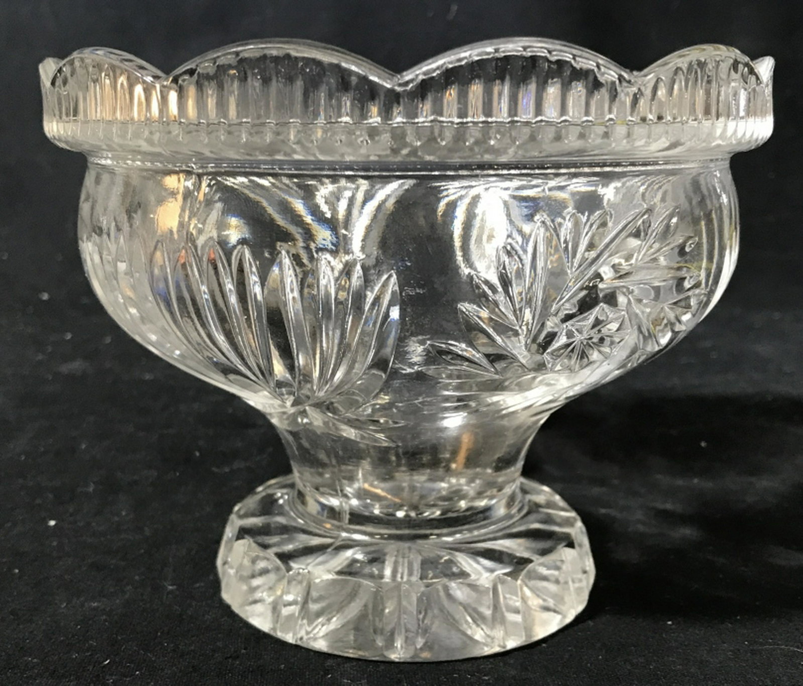 Scalloped Edge Crystal Wide Cup Chalice Vessel Cut: Cut Crystal in Repousse Style with base and short Stem. About 6.5 in. diameter, 5 in. Height. Heavy Piece, Possibly Contains Lead Crystal. Chalice, Crystal Chalice, Bowl, Repousse Crystal Bowl, Light 